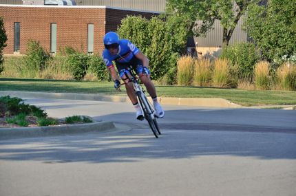 Time trail racer turning on to Elk Grove Blvd