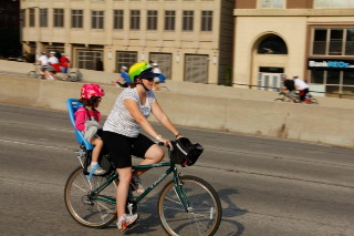 woman and Child in Bike Child Seat